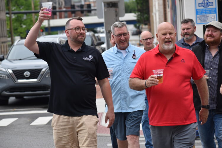 Wheeling Toasts Launch of PODA District
